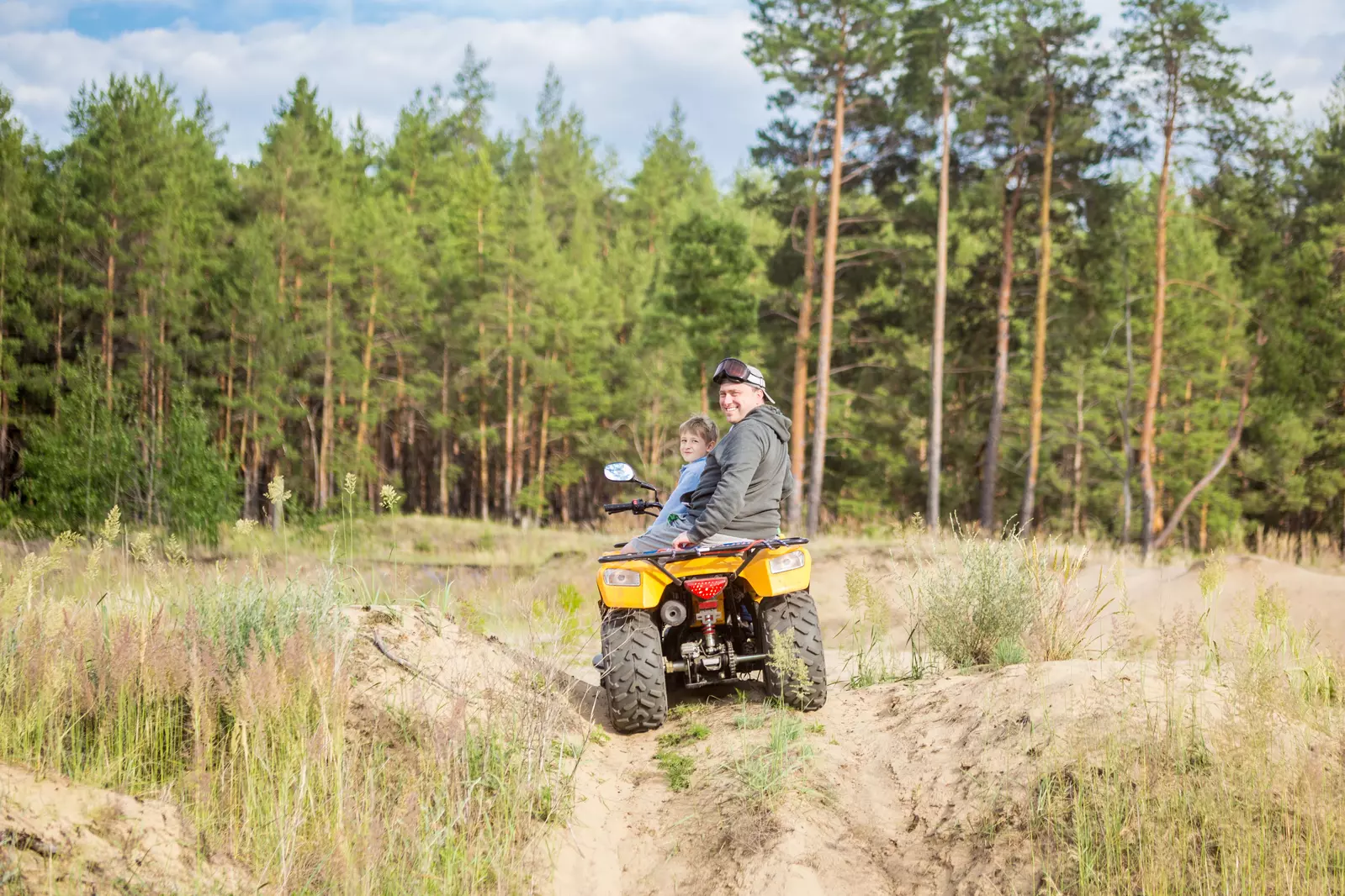 kid-and-dad-on-atv