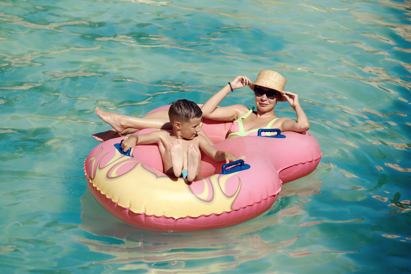 mom and kid in pool