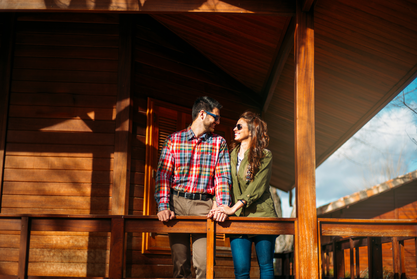 couple on cabin balcony