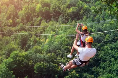 couple ziplining in the Smoky Mountains 