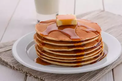 stack of syrup and butter covered pancakes in pigeon forge