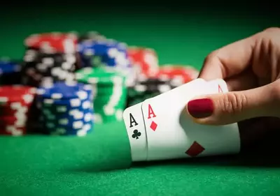 woman playing poker in a casino