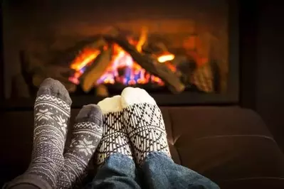 log fireplace inside a Gatlinburg cabin on a rainy day in the Smoky Mountains