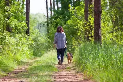 Woman enjoying pet friendly Smoky Mountain vacation