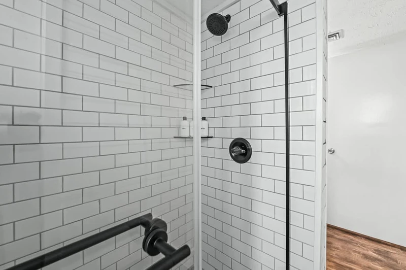 View of White Tiled Shower