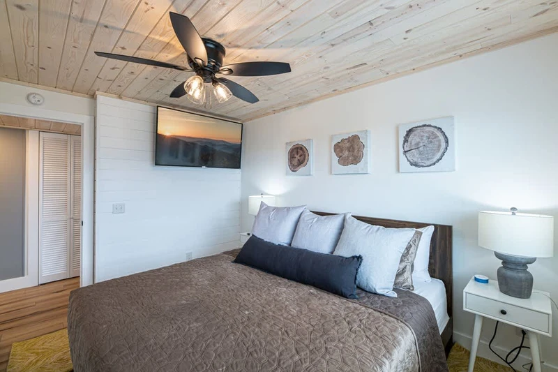 First bedroom on the main level w/ Smart TV